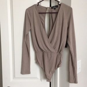 Tan/beige body suit.